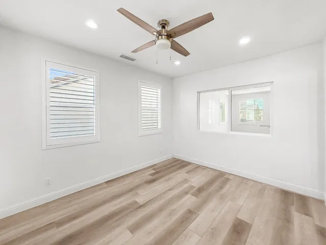 a view of a hallway with stairs