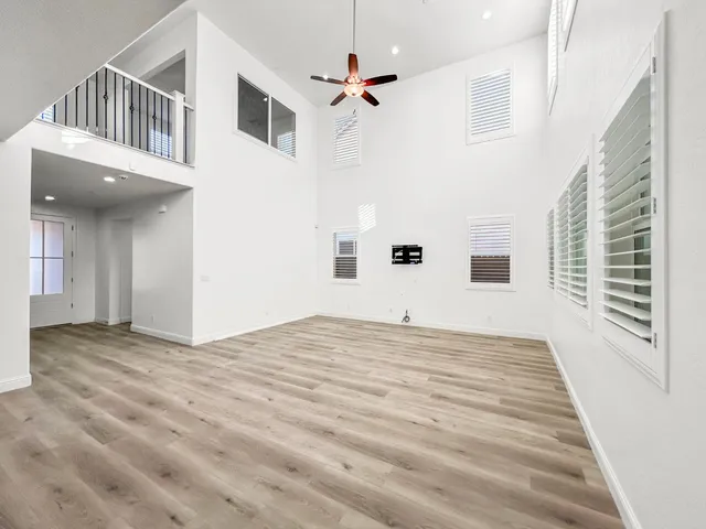 a kitchen with stainless steel appliances granite countertop a sink and a stove top oven