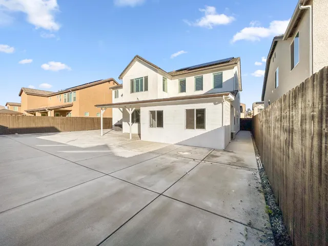a house view with a outdoor space