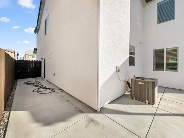 a view of a livingroom with furniture and stairs
