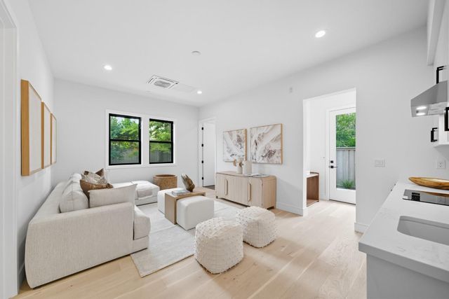 a living room with furniture and a couch