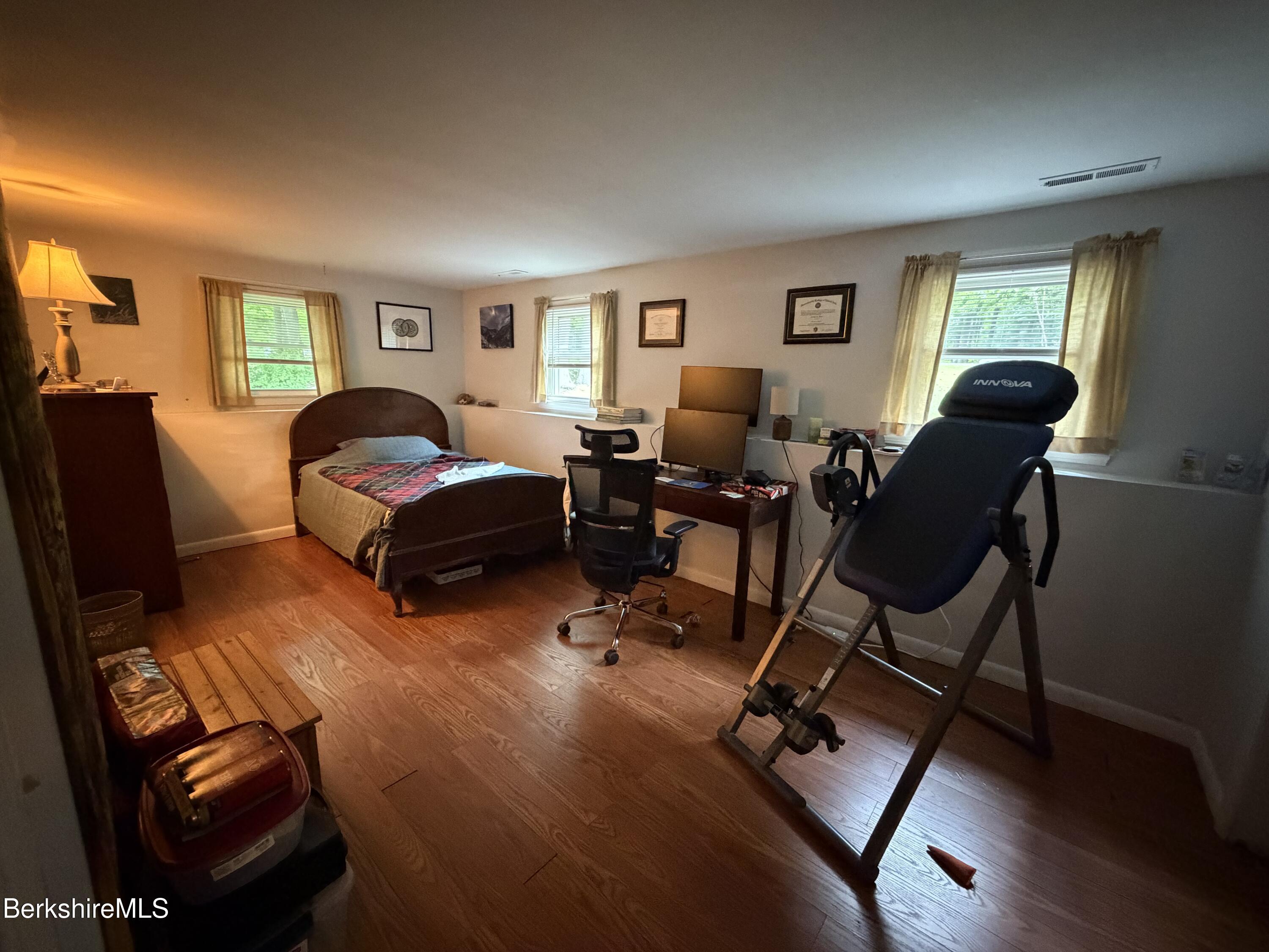 20 Sullivan Lane Lenox, MA 01240 - Photo 15 of 23 a living room with furniture and a window