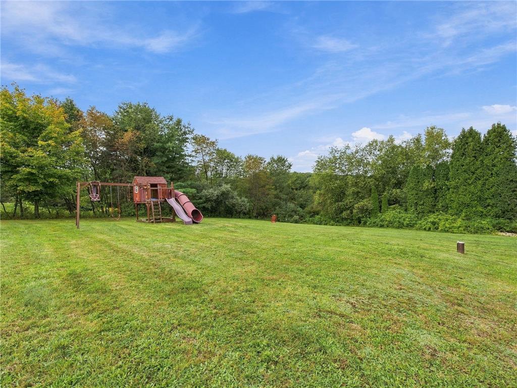 90 Gun Club Road Palmerton, PA 18071 - Photo 19 of 58 Mature trees frame a grassy lawn offering plenty of open space for outdoor activities.