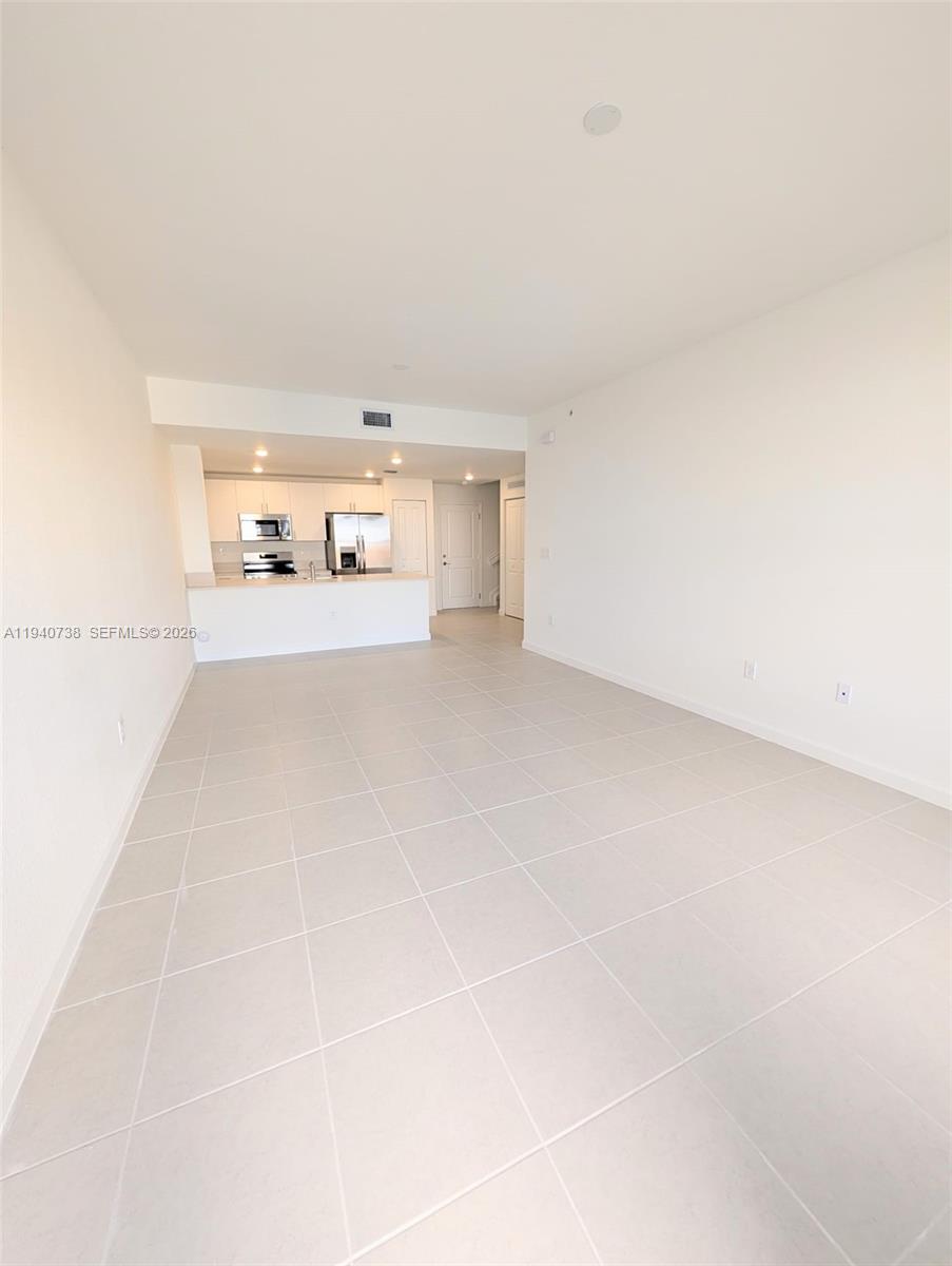 15601 Southwest 280th Street, Unit 4 Homestead, FL 33032 - Photo 3 of 9 a view of a room with a sink