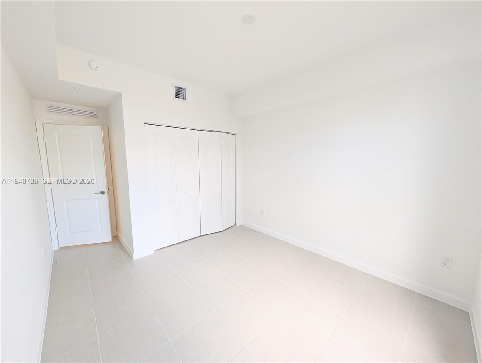 15601 Southwest 280th Street, Unit 4 Homestead, FL 33032 - Photo 6 of 9 a view of empty room