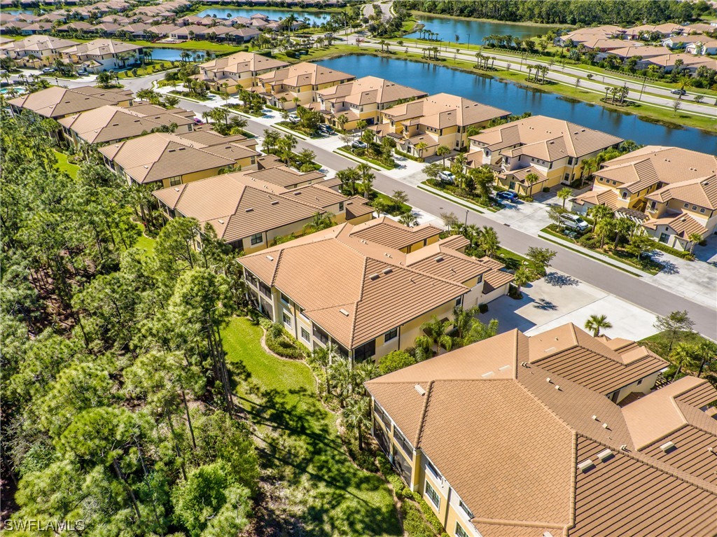 10471 Casella Way, Unit 101 Fort Myers, FL 33913 - Photo 2 of 4 an aerial view of a house with a ocean view