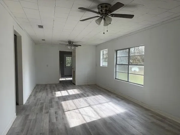 a view of an empty room and window