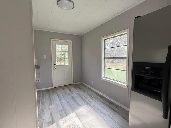 a view of an empty room and window