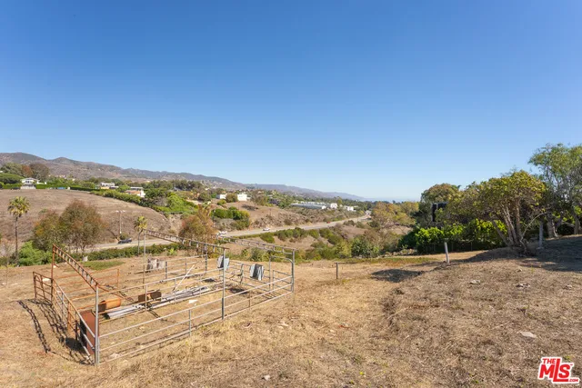 a view of a outdoor space with a mountain