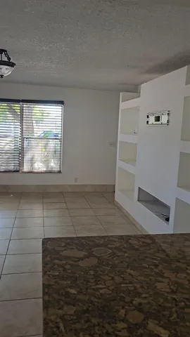 a view of lot of kitchen and window