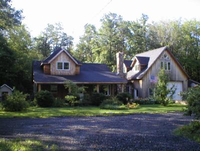 a view of a yard in front of a house