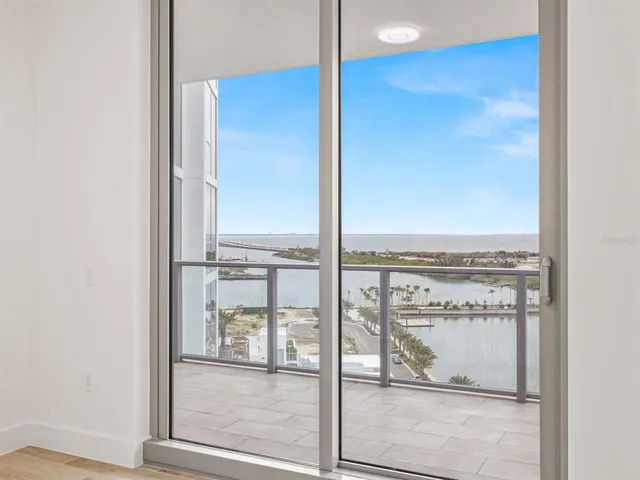 a bathroom with a granite countertop toilet a sink and bathtub