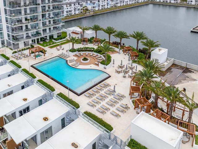 a view of a hallway with a bathroom