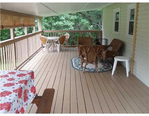148 High Acres Road Harmony, PA 16037 - Photo 12 of 18 Patio/Deck. huge deck to enjoy the days and summer evenings on