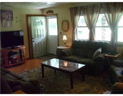 148 High Acres Road Harmony, PA 16037 - Photo 5 of 18 Living Room. cozy living room notice the updated floors, windows and doors!