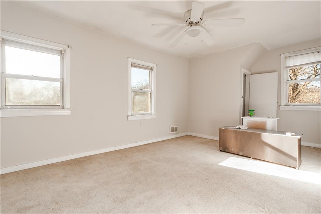 4 Quarry Road Sewickley, PA 15143 - Photo 14 of 19 a living room with furniture and a window