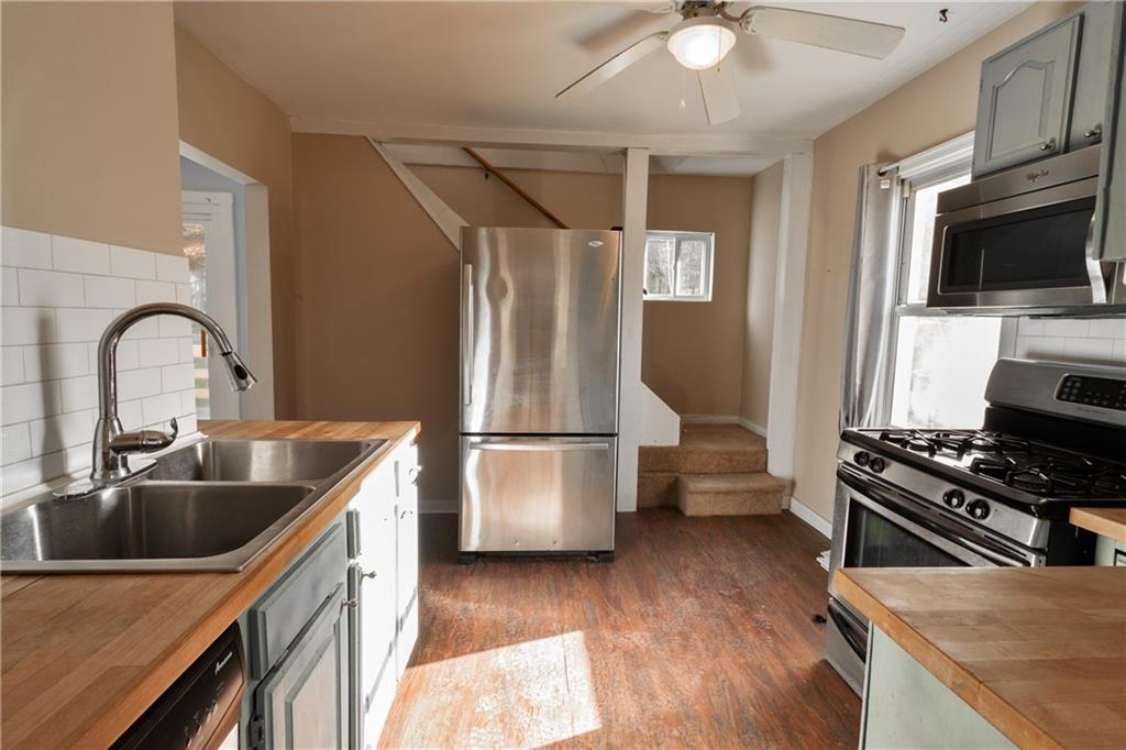 4 Quarry Road Sewickley, PA 15143 - Photo 4 of 19 a kitchen with a refrigerator and a sink