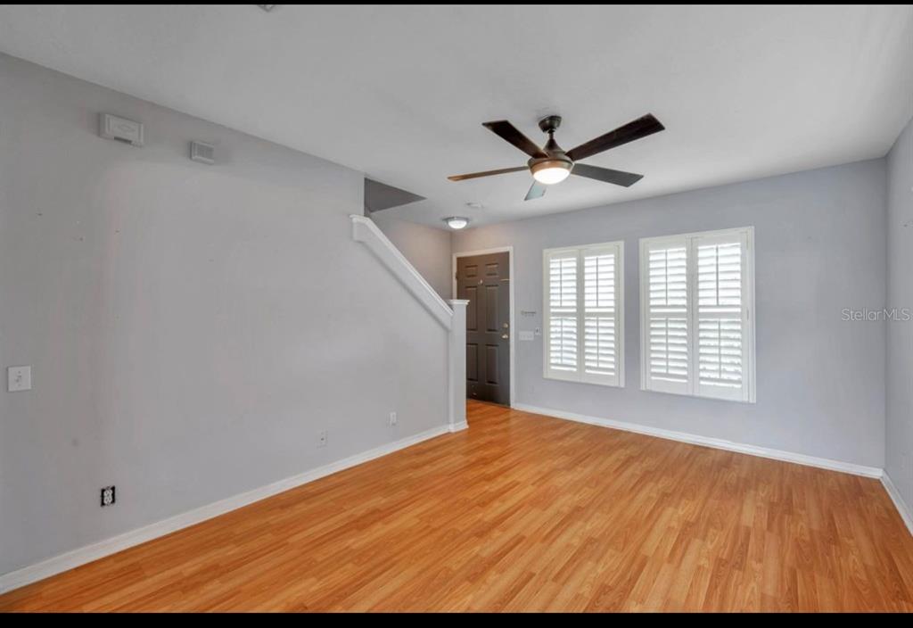 13059 Thoroughbred Loop Largo, FL 33773 - Photo 5 of 32 a view of an empty room with a window