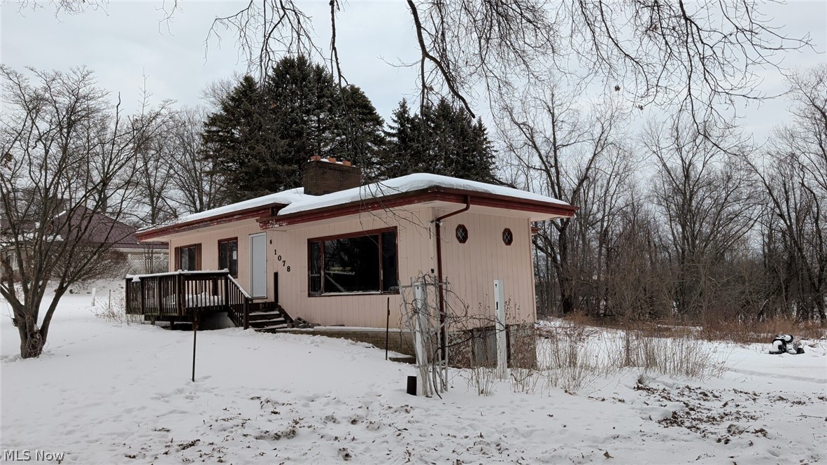1078 Aberagg Road Atwater, OH 44201 - Photo 2 of 14 View of front of property with a chimney and a deck