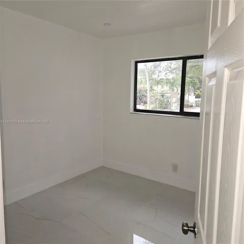 a bathroom with a sink toilet and bathtub
