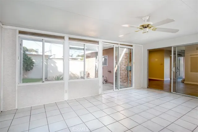 a view of an empty room and window
