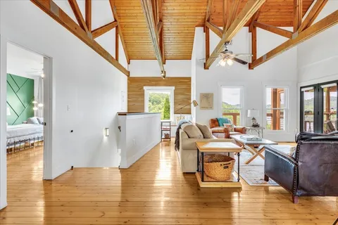 a living room with furniture and a view of living room