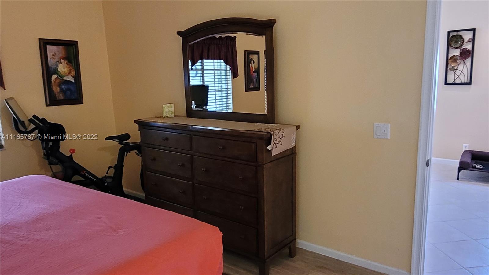 Baywinds West Palm Beach, FL 33411 - Photo 20 of 38 a bedroom with a bed and a mirror