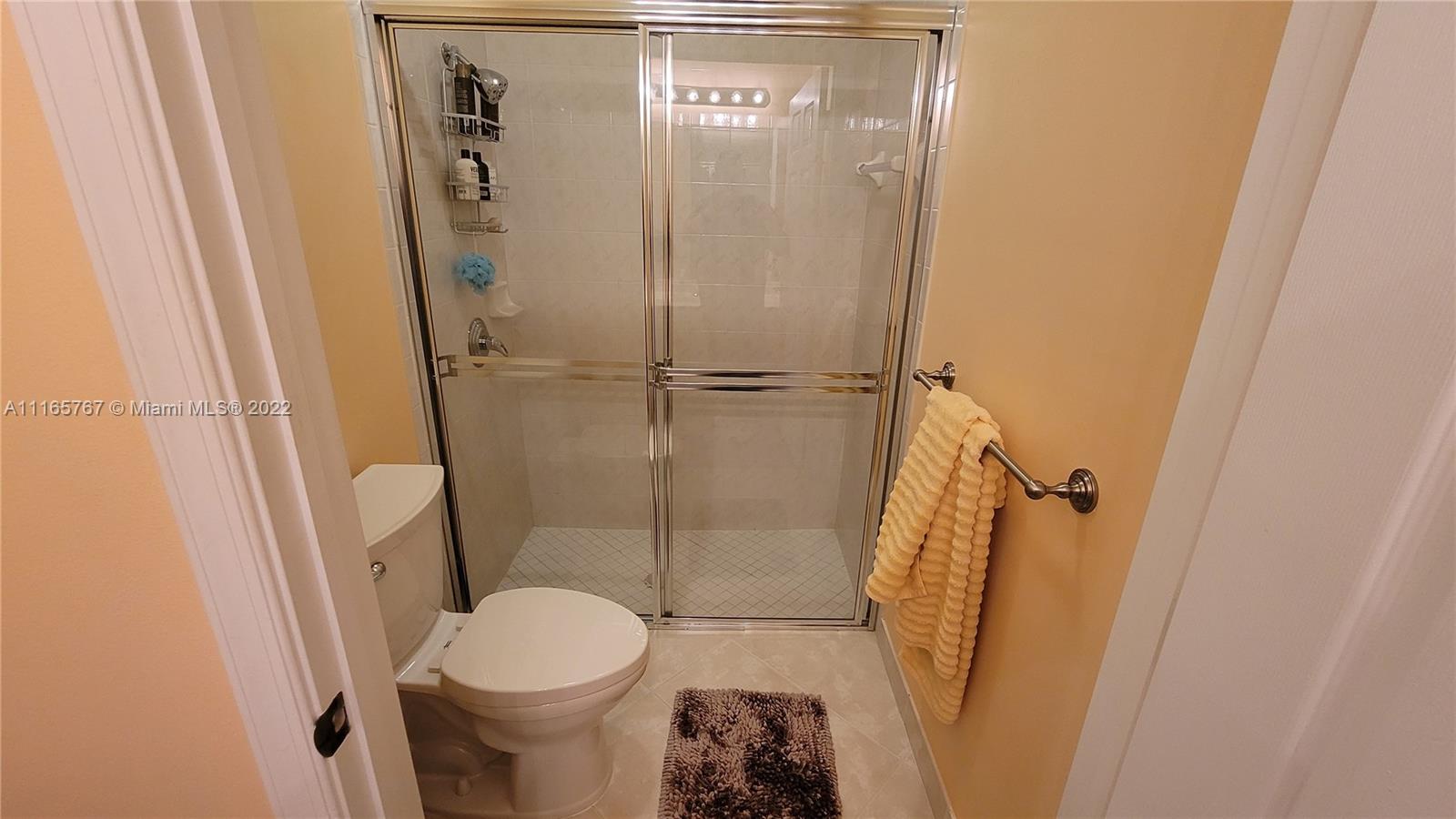 Baywinds West Palm Beach, FL 33411 - Photo 23 of 38 a bathroom with a toilet and a shower