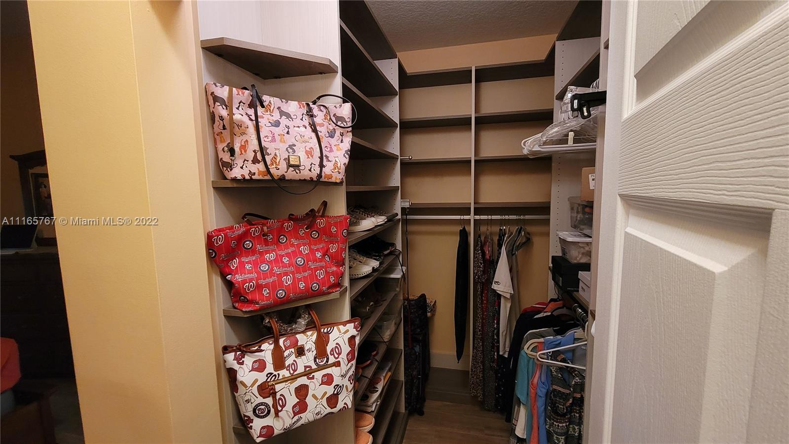 Baywinds West Palm Beach, FL 33411 - Photo 25 of 38 a view of a walk in closet