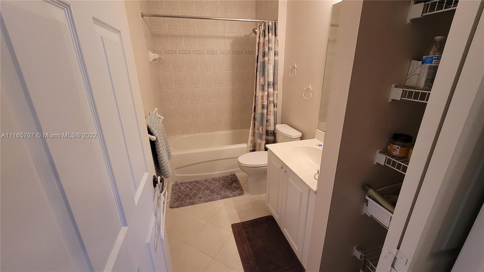 Baywinds West Palm Beach, FL 33411 - Photo 29 of 38 a bathroom with sink and a tub