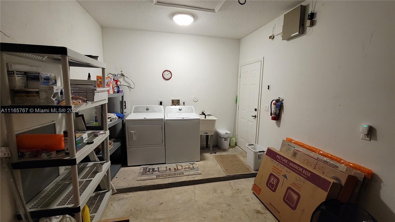 Baywinds West Palm Beach, FL 33411 - Photo 33 of 38 a room with storage and utility