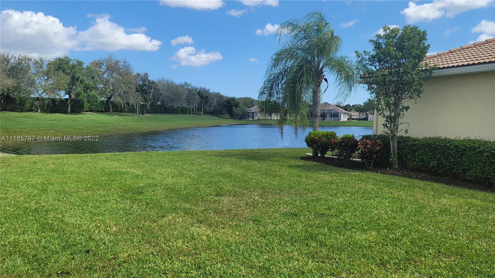 Baywinds West Palm Beach, FL 33411 - Photo 8 of 38 a view of a garden and basketball court