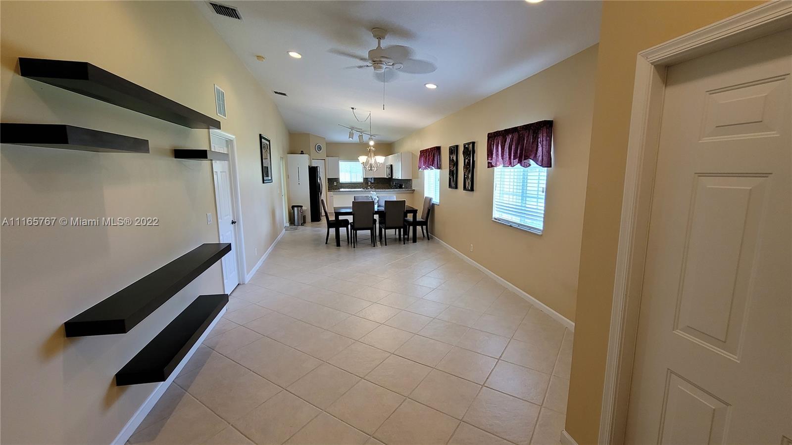 Baywinds West Palm Beach, FL 33411 - Photo 10 of 38 a lobby with furniture and window