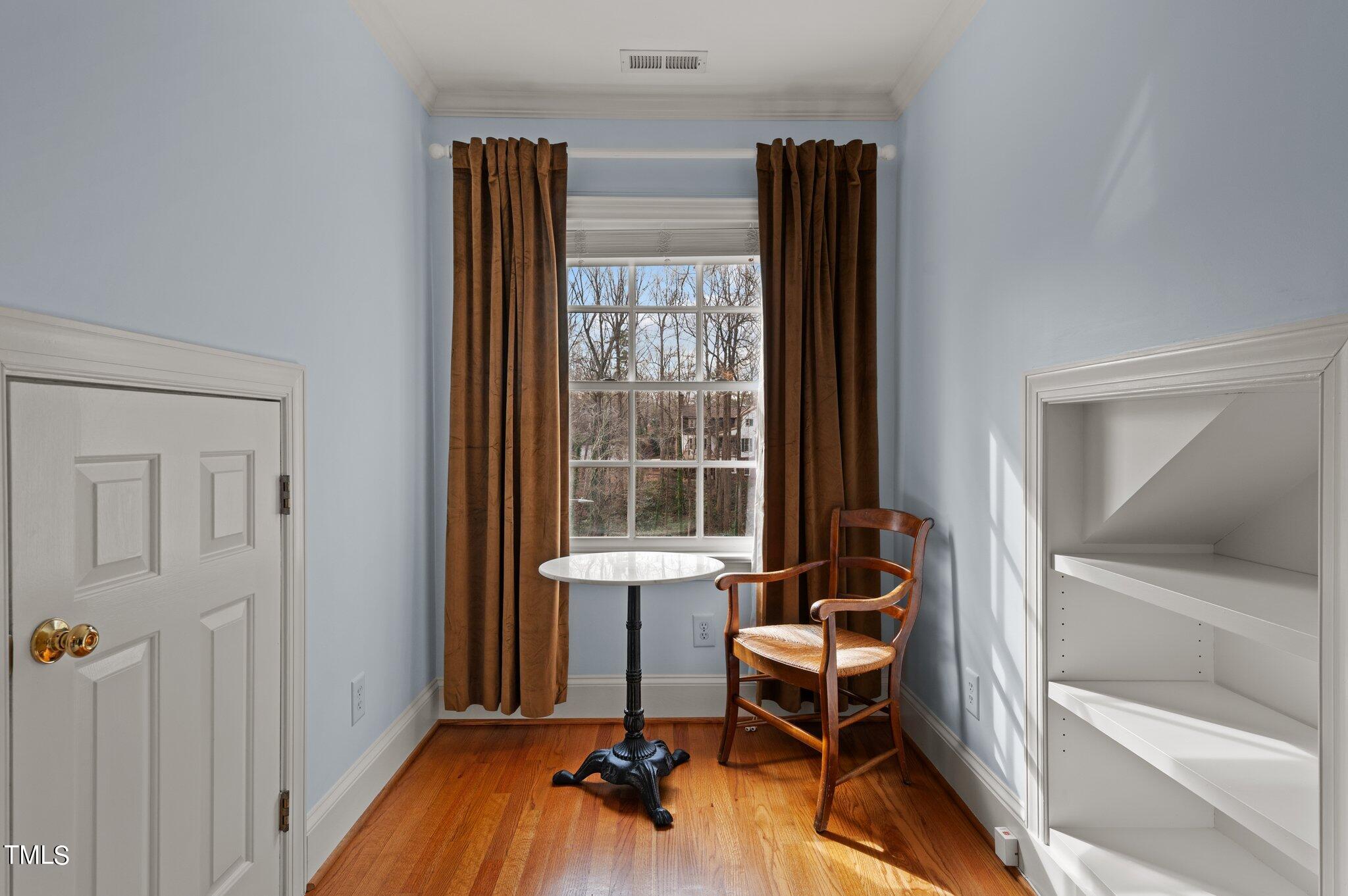 3000 Woodgreen Drive Raleigh, NC 27607 - Photo 40 of 55 a view of a room with gym equipment and windows