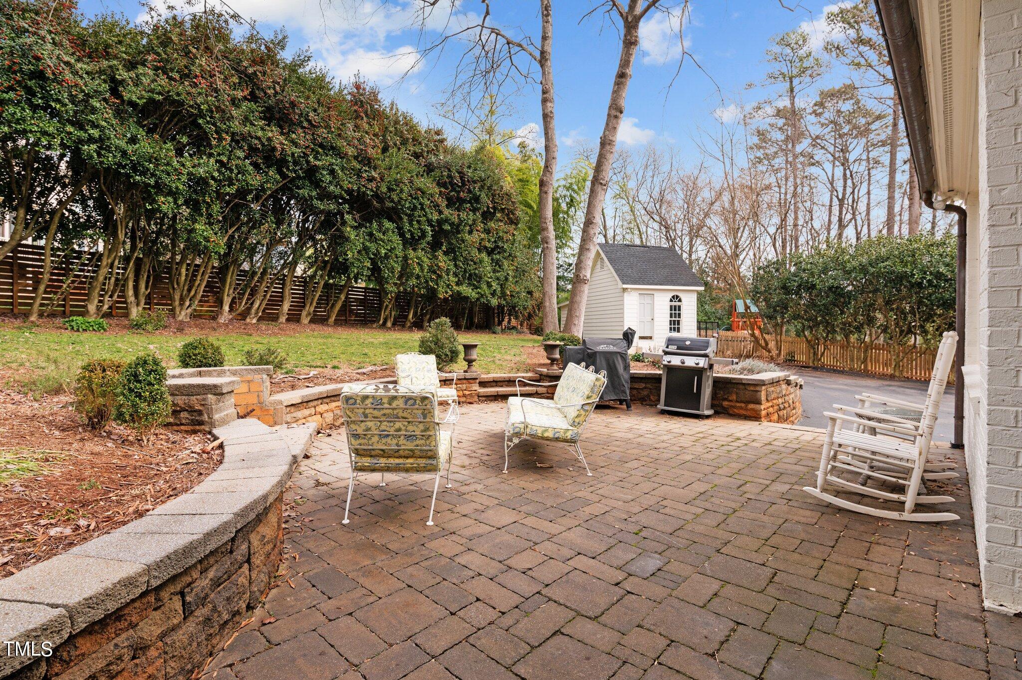 3000 Woodgreen Drive Raleigh, NC 27607 - Photo 45 of 55 a view of a patio with swimming pool