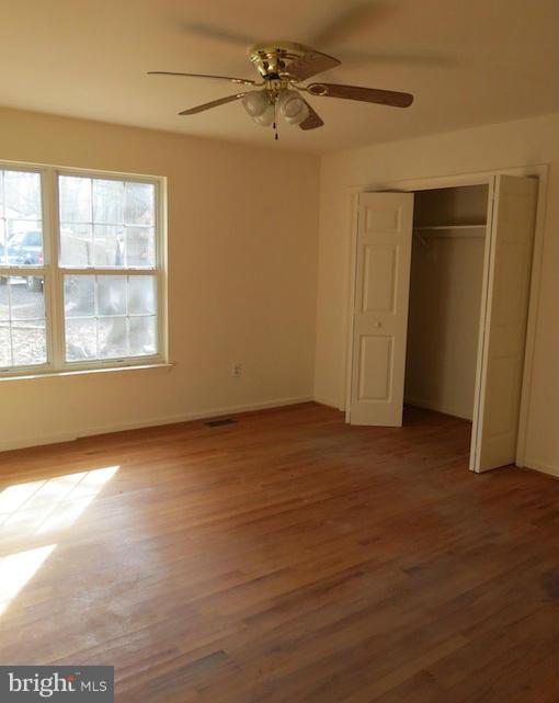 11520 Big Sandy Run Road Lusby, MD 20657 - Photo 5 of 7 a view of an empty room with a window