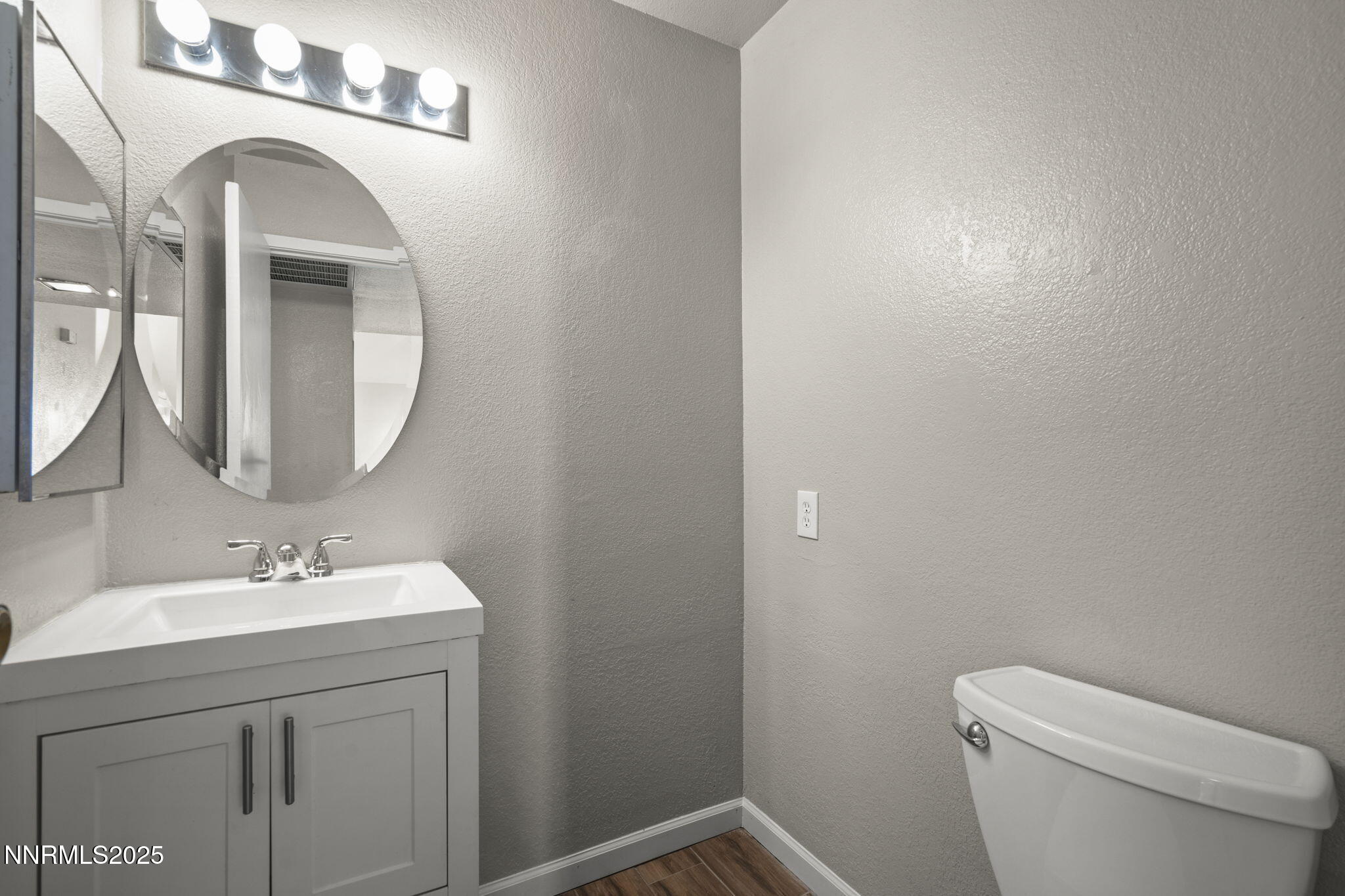 2768 Azuza Way Reno, NV 89502 - Photo 13 of 26 a bathroom with a sink and a toilet