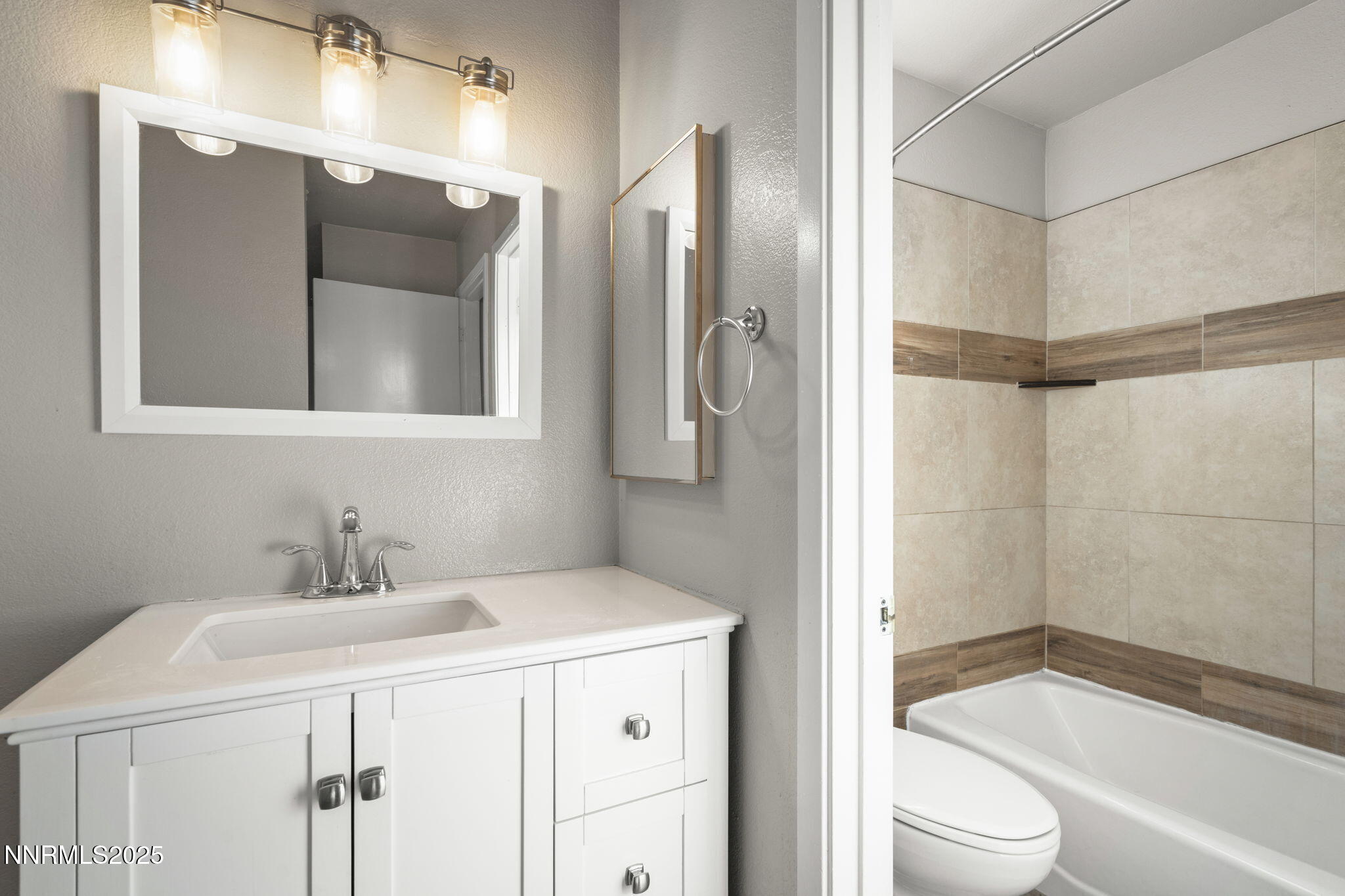 2768 Azuza Way Reno, NV 89502 - Photo 18 of 26 a bathroom with a sink a toilet and shower