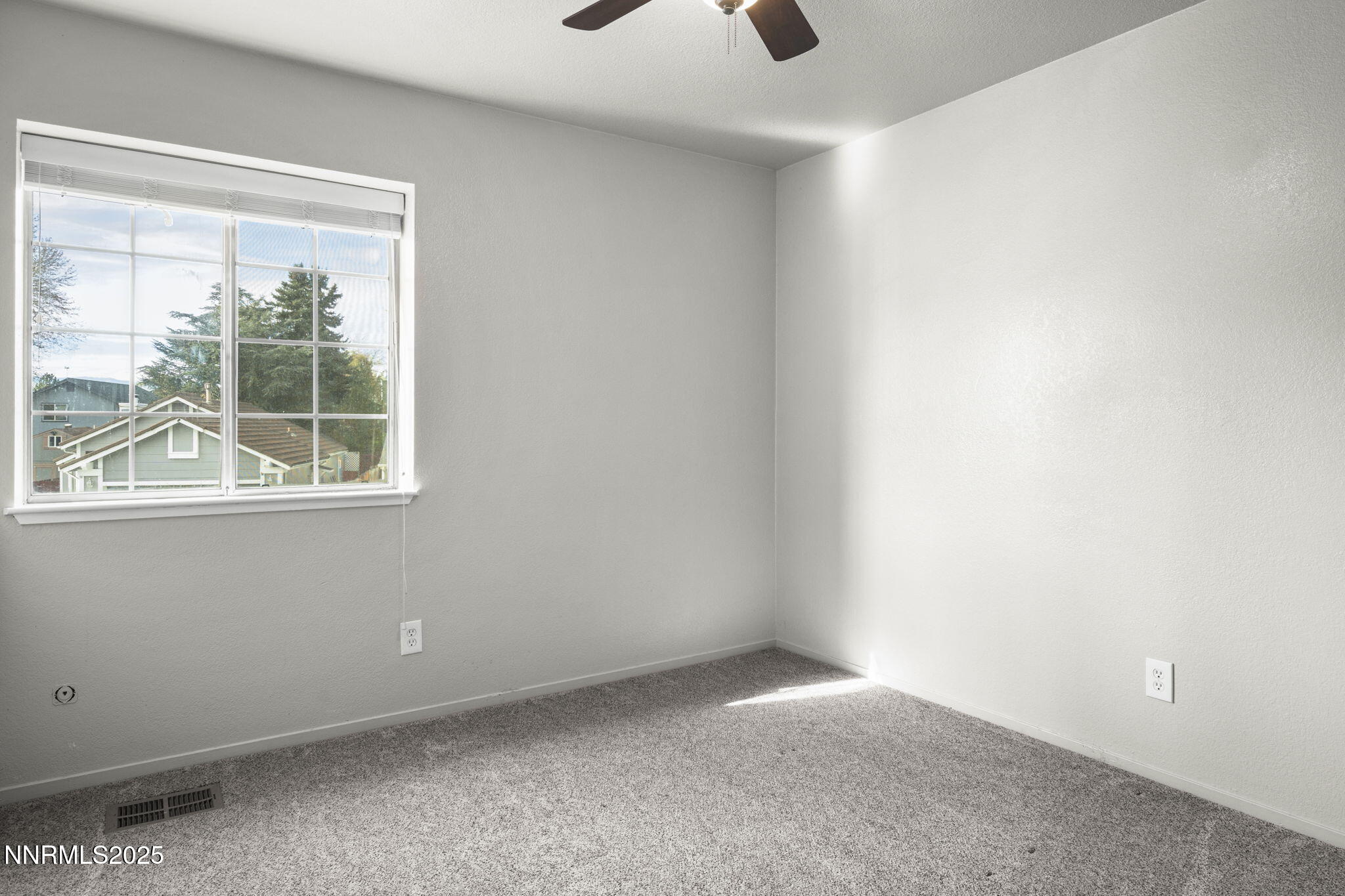 2768 Azuza Way Reno, NV 89502 - Photo 19 of 26 a view of an empty room with a window