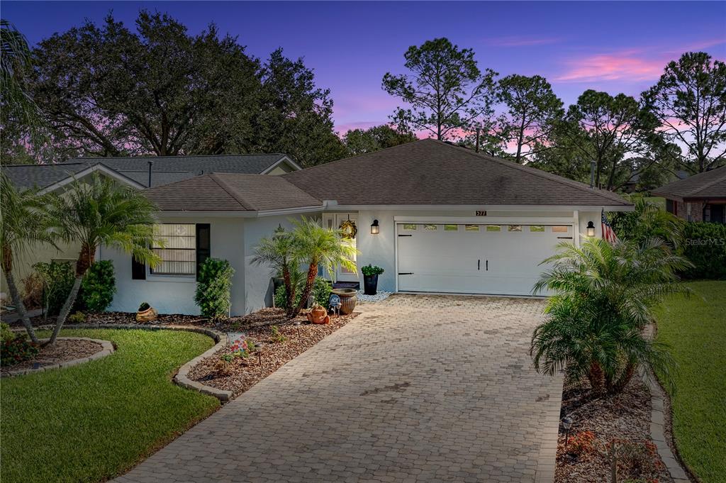 577 St Andrews Road Winter Haven, FL 33884 - Photo 1 of 1 EXTERIOR FRONT AT DAWN