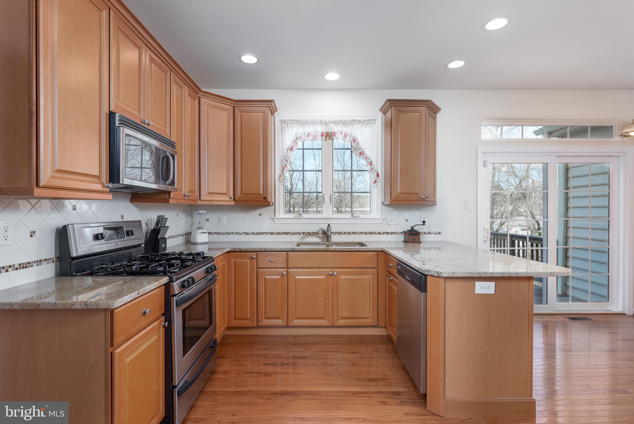 1207 South Rapps Dam Road Phoenixville, PA 19460 - Photo 20 of 33 U Shaped Granite Kitchen with Gas Cooking