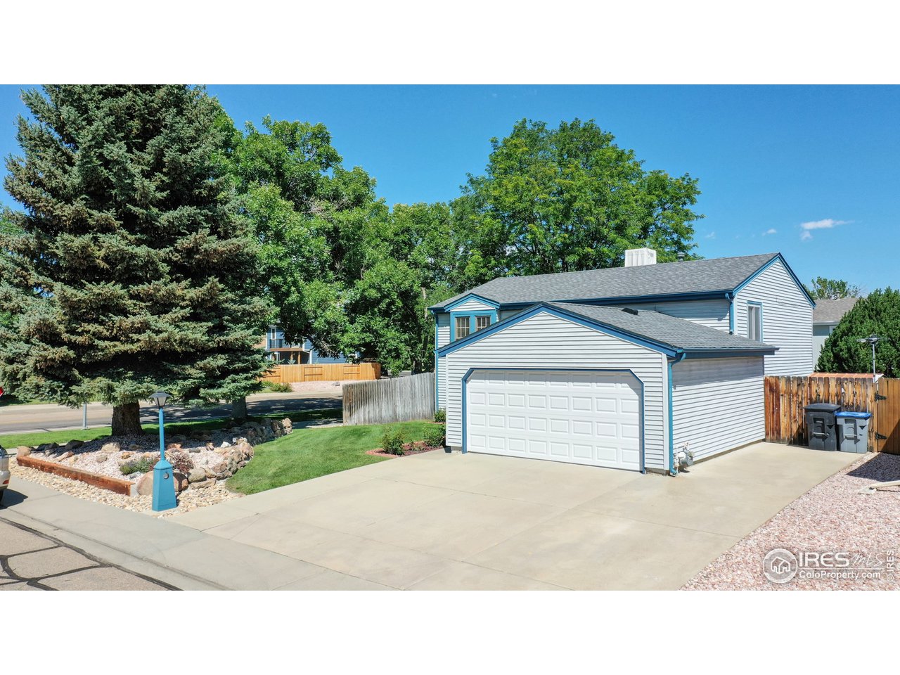 1554 Ervine Avenue Longmont, CO 80501 - Photo 2 of 31 a house view with a outdoor space