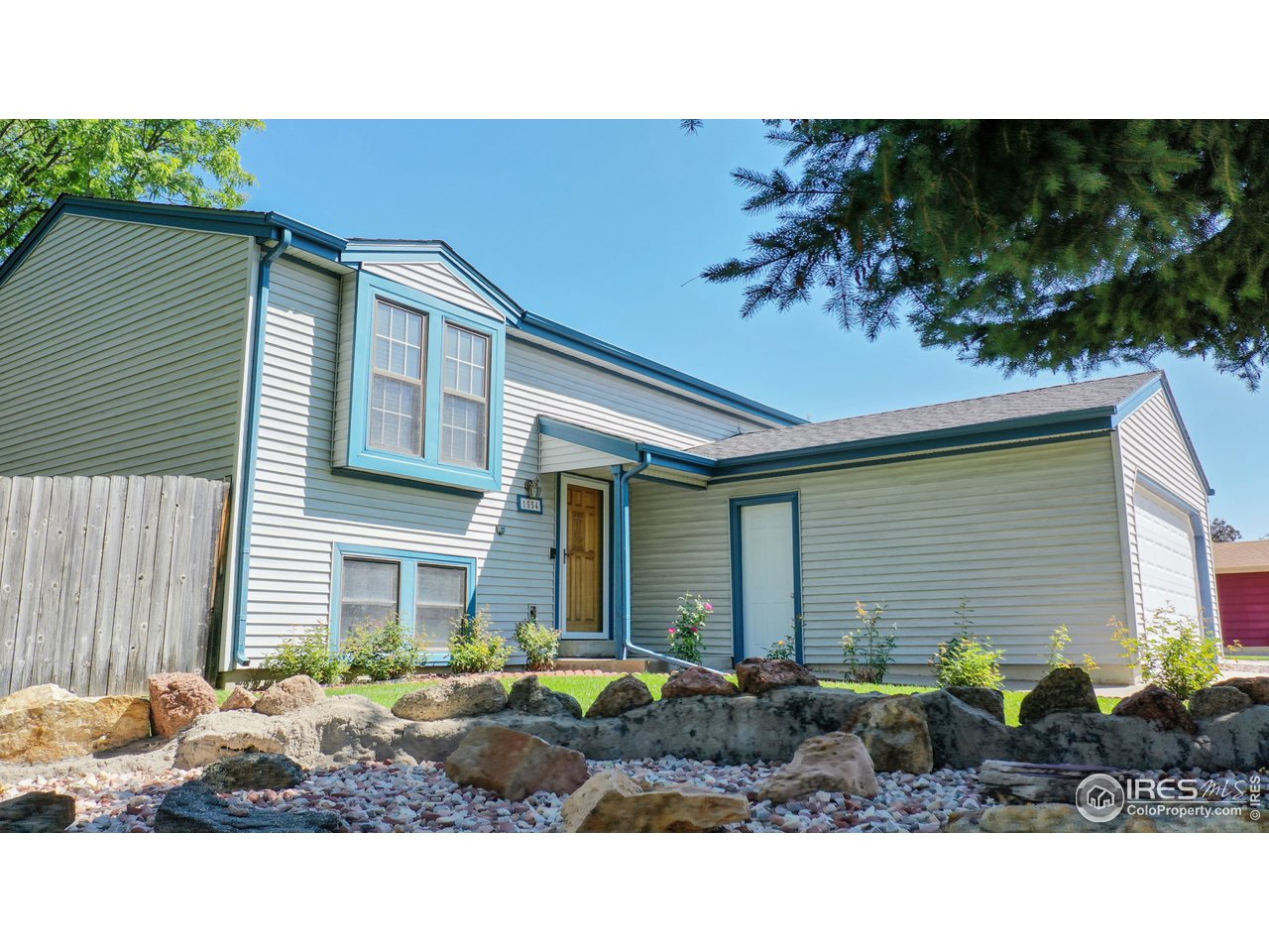 1554 Ervine Avenue Longmont, CO 80501 - Photo 27 of 31 a black and white photo of a house
