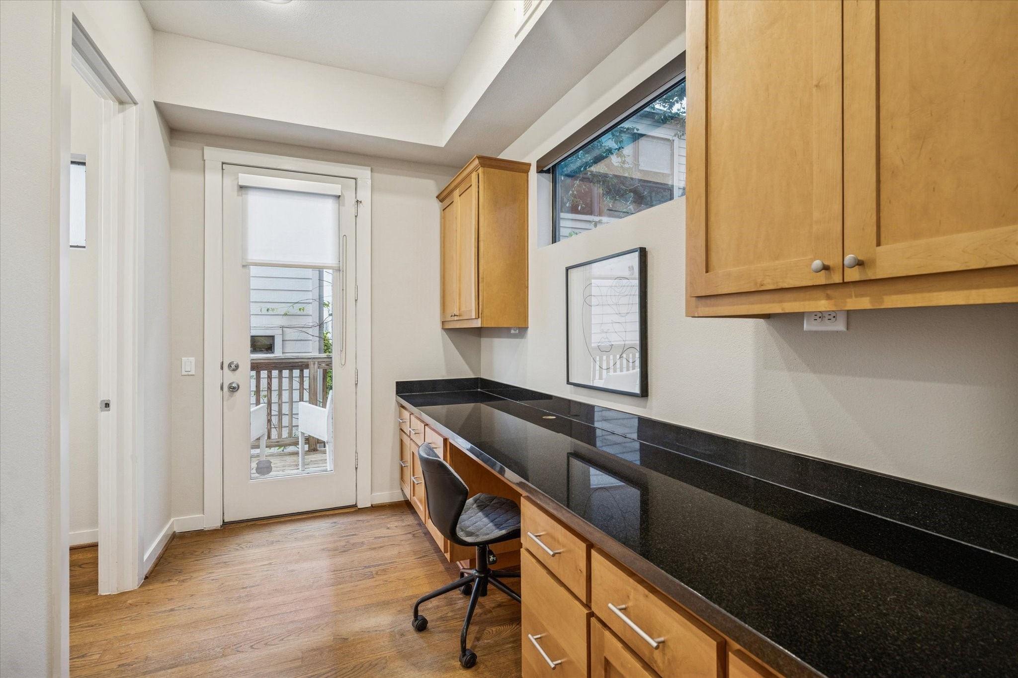 220 Detering Street Houston, TX 77007 - Photo 13 of 27 a kitchen with a sink and a refrigerator