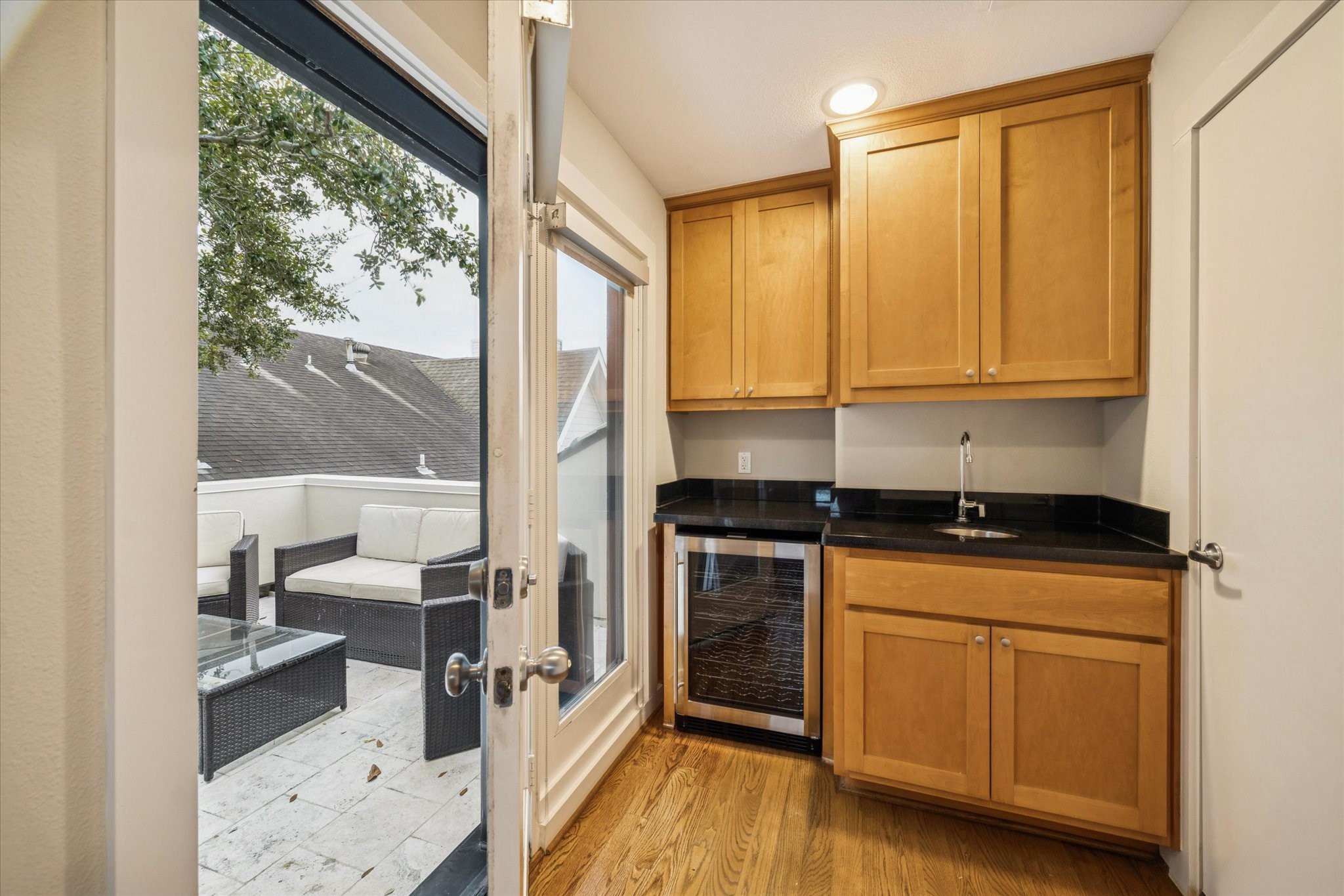 220 Detering Street Houston, TX 77007 - Photo 22 of 27 a kitchen with stainless steel appliances granite countertop a stove a sink and a refrigerator