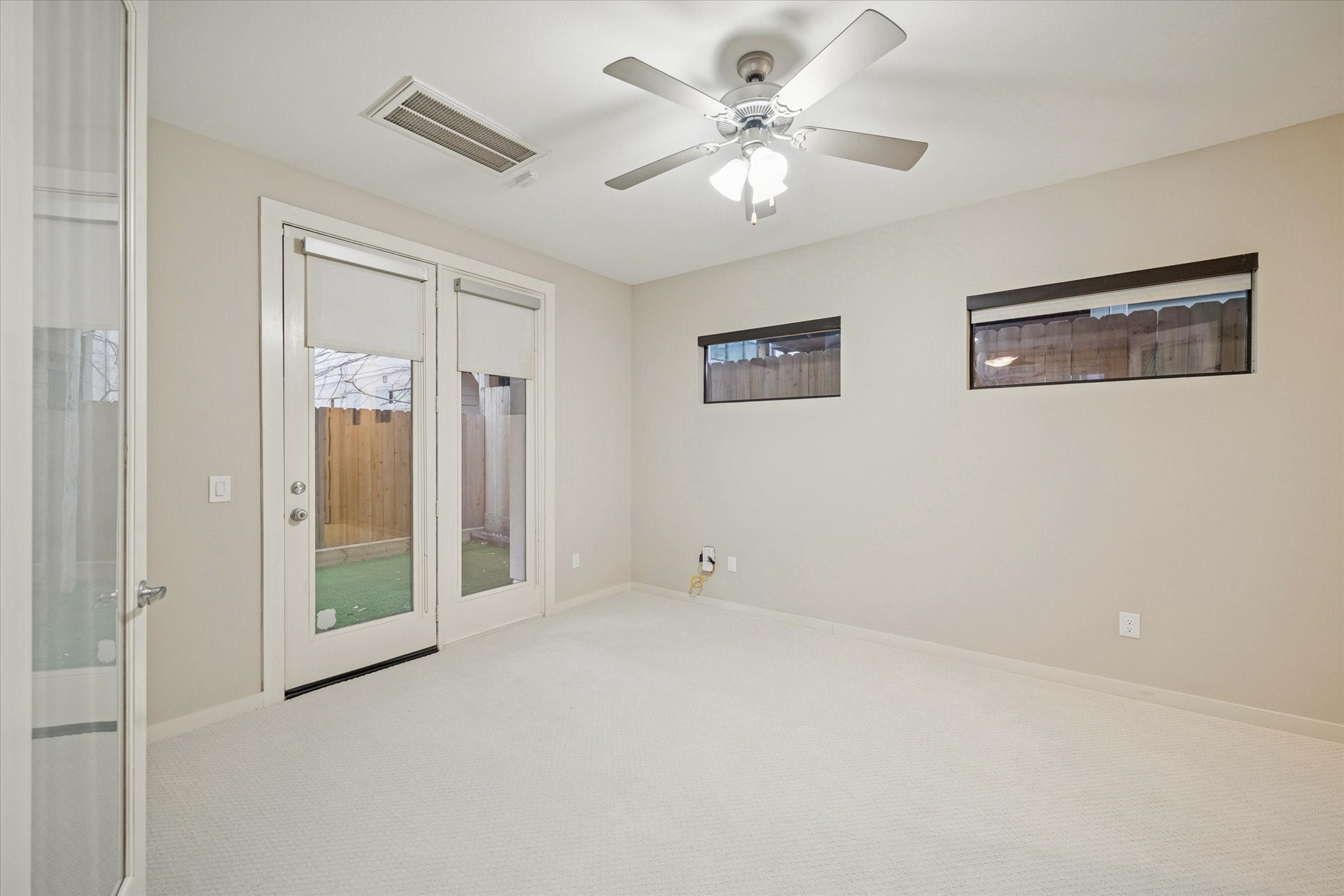 220 Detering Street Houston, TX 77007 - Photo 24 of 27 a view of an empty room with a window
