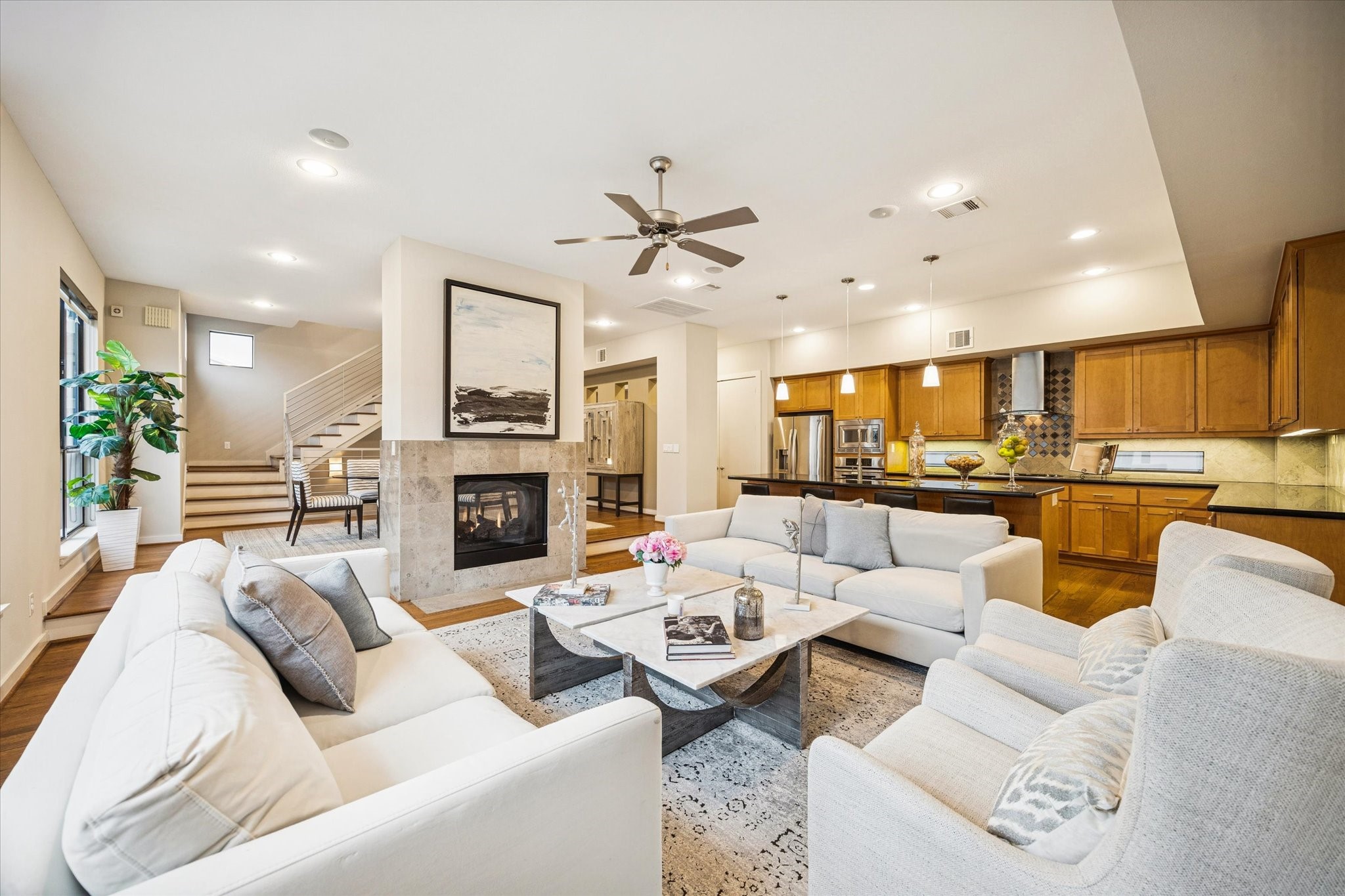 220 Detering Street Houston, TX 77007 - Photo 8 of 27 a living room with furniture fireplace and kitchen view