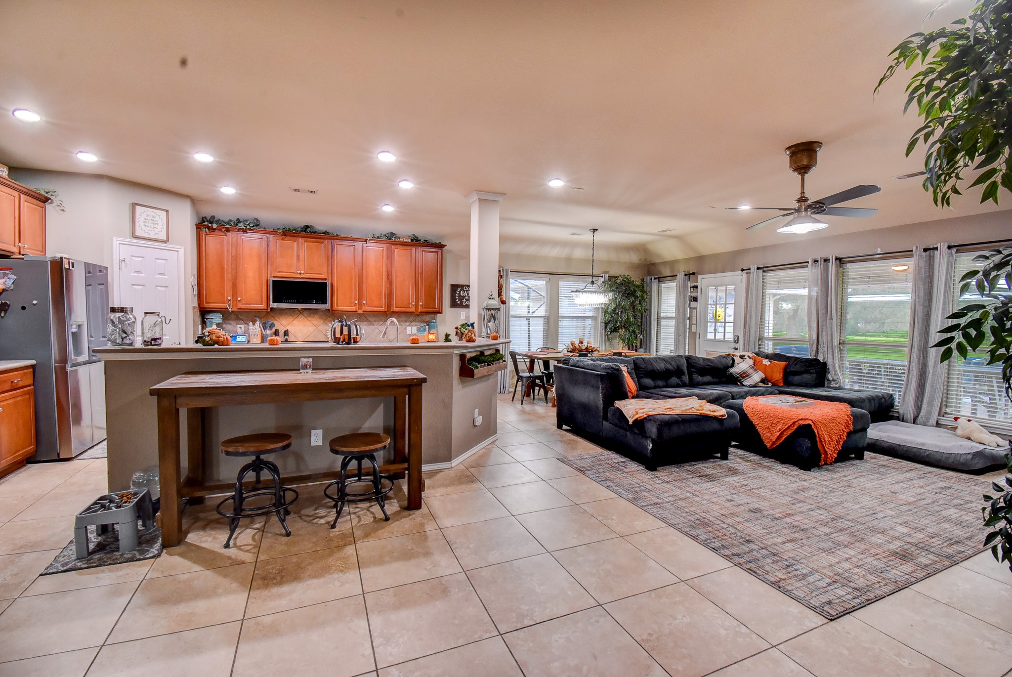 838 County Road 968 A Angleton, TX 77515 - Photo 12 of 49 a large kitchen with a table and chairs
