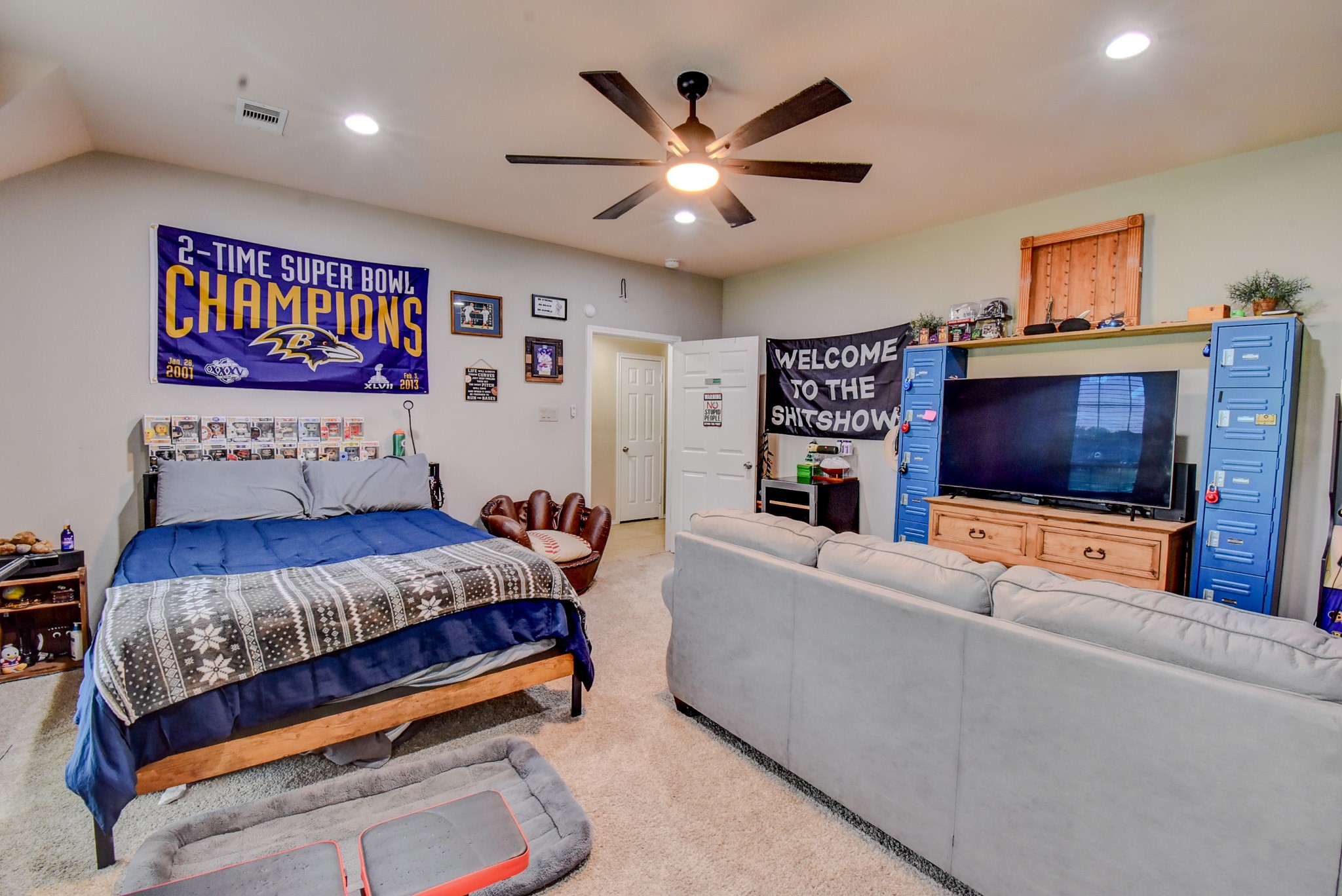 838 County Road 968 A Angleton, TX 77515 - Photo 30 of 49 a bedroom with a bed and a flat screen tv