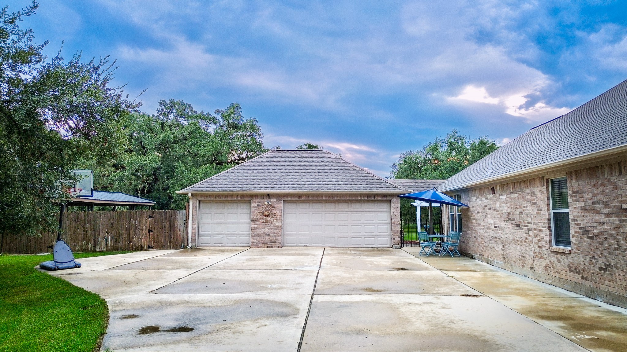 838 County Road 968 A Angleton, TX 77515 - Photo 3 of 49 a house with yard in front of it